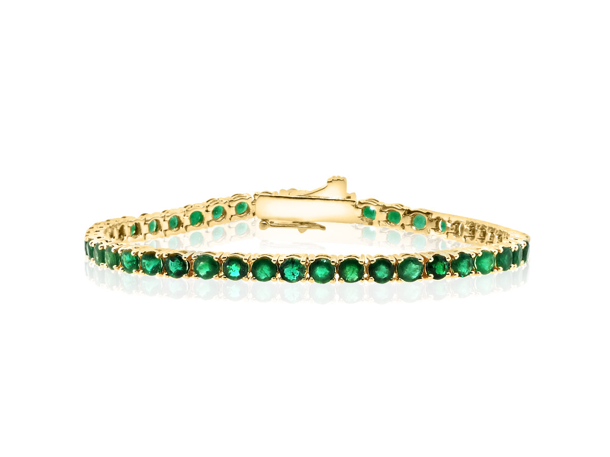 Emerald tennis bracelet deals yellow gold